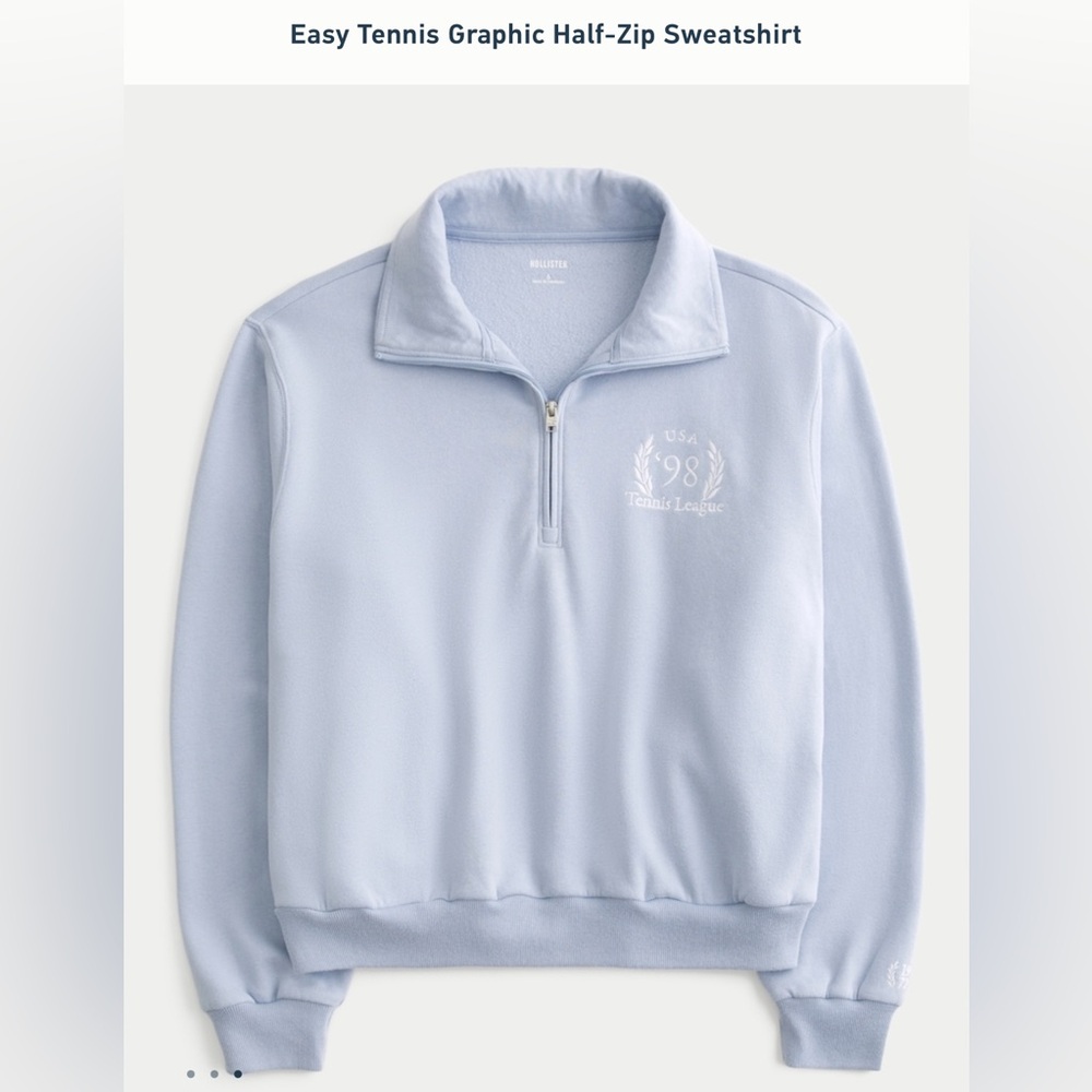 Hollister women’s 
Light Blue Graphic Half-Zip up sweater
